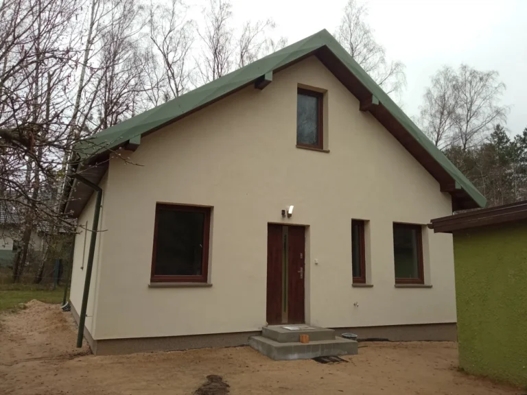 Budowa domów energooszczędnych Łódź - dom z użytkowym poddaszem i dachem dwuspadowym