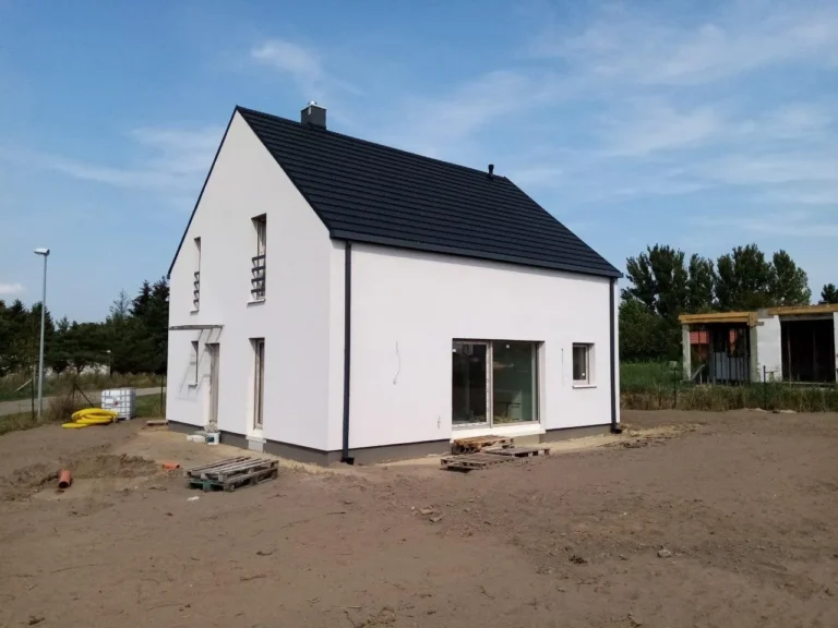 Budowa domów Poznań - dom z użytkowym poddaszem i dachem dwuspadowym