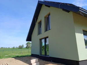 Domy energooszczędne Wrocław - dom z użytkowym poddaszem, dachem dwuspadowym i garażem