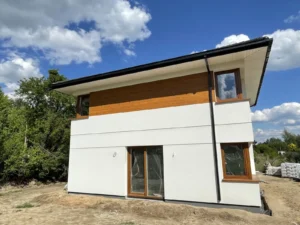 dom piętrowy z dachem kopertowym i garażem 160 m2 Warszawa