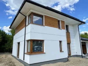 dom piętrowy z dachem kopertowym i garażem 160 m2 Warszawa