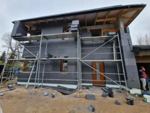 dom piętrowy z dachem kopertowym i garażem 160 m2 Warszawa