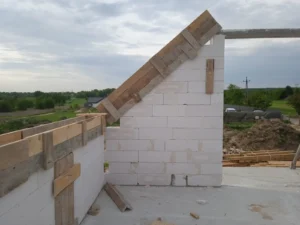 dom z użytkowym poddaszem, dachem dwuspadowym i garażem 240 m2 Łódź