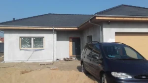 dom parterowy z dachem kopertowym i garażem 170 m2 Poznań