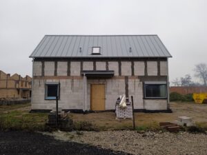 dom z poddaszem użytkowym, dachem dwuspadowym i garażem 170 m2 Poznań