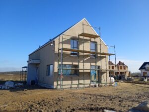 dom z poddaszem użytkowym, dachem dwuspadowym i garażem 170 m2 Poznań