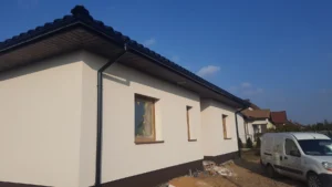 Budowa domów Poznań - dom parterowy z dachem kopertowym