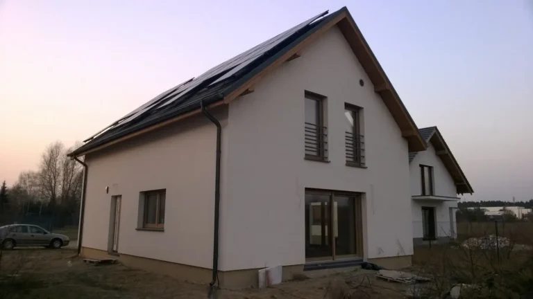 Firma budowlana Poznań - dom z użytkowym poddaszem i dachem dwuspadowym